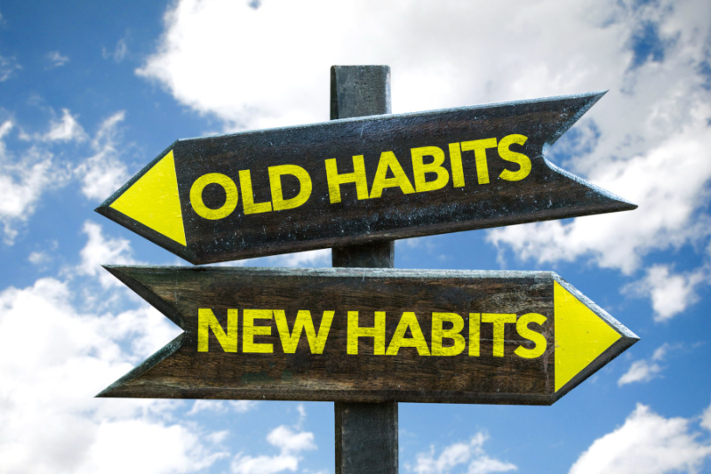 image of signpost pointing to old and new habits